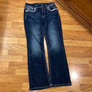 I’m looking to sell these Miss Me boot cut jeans, been worn a couple times.